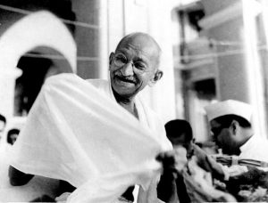 Mahatma_Gandhi_laughing.jpeg-615x467